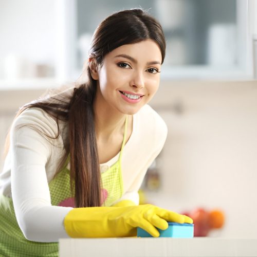 beautiful woman protective gloves cleaning kitchen table with sponge 392895 114993 (1)